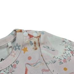 Close up of shoulder snap buttons on organic baby dress brand Duper DuDu design by a NICU nurse