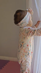 Baby girl wearing pink fairy print organic cotton sleepsuit with snaps brand Duper DuDu design by a NICU nurse