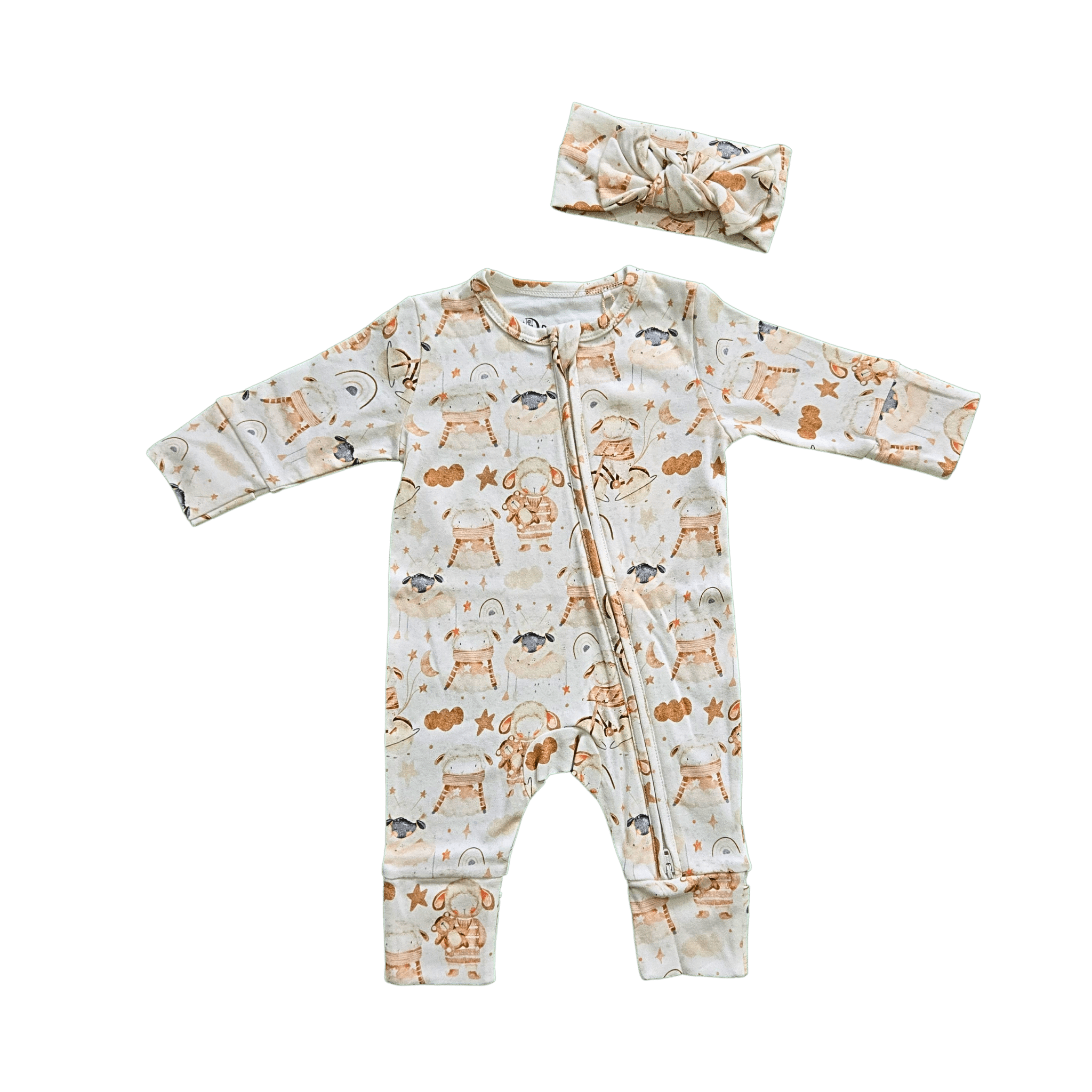 Baby wearing neutral organic cotton sheep print bow brand Duper DuDu design by a NICU nurse