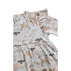 Flat lay of Little Sheep organic cotton dress bodysuit brand Duper DuDu design by a NICU nurse