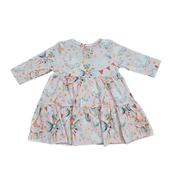 Flat lay of pink organic cotton baby dress with tiered skirt brand Duper DuDu design by a NICU nurse