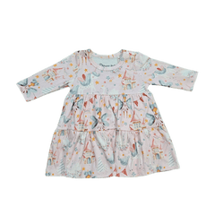 Flat lay of pink organic cotton baby dress with tiered skirt brand Duper DuDu design by a NICU nurse