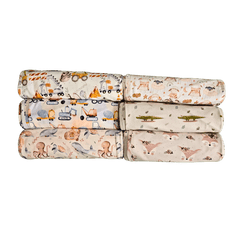 Collection of rolled organic baby blankets featuring Little Sheep print brand Duper DuDu design by a NICU nurse