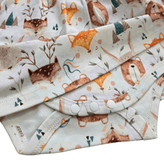 Close up of organic cotton safari print dress details brand Duper DuDu design by a NICU nurse