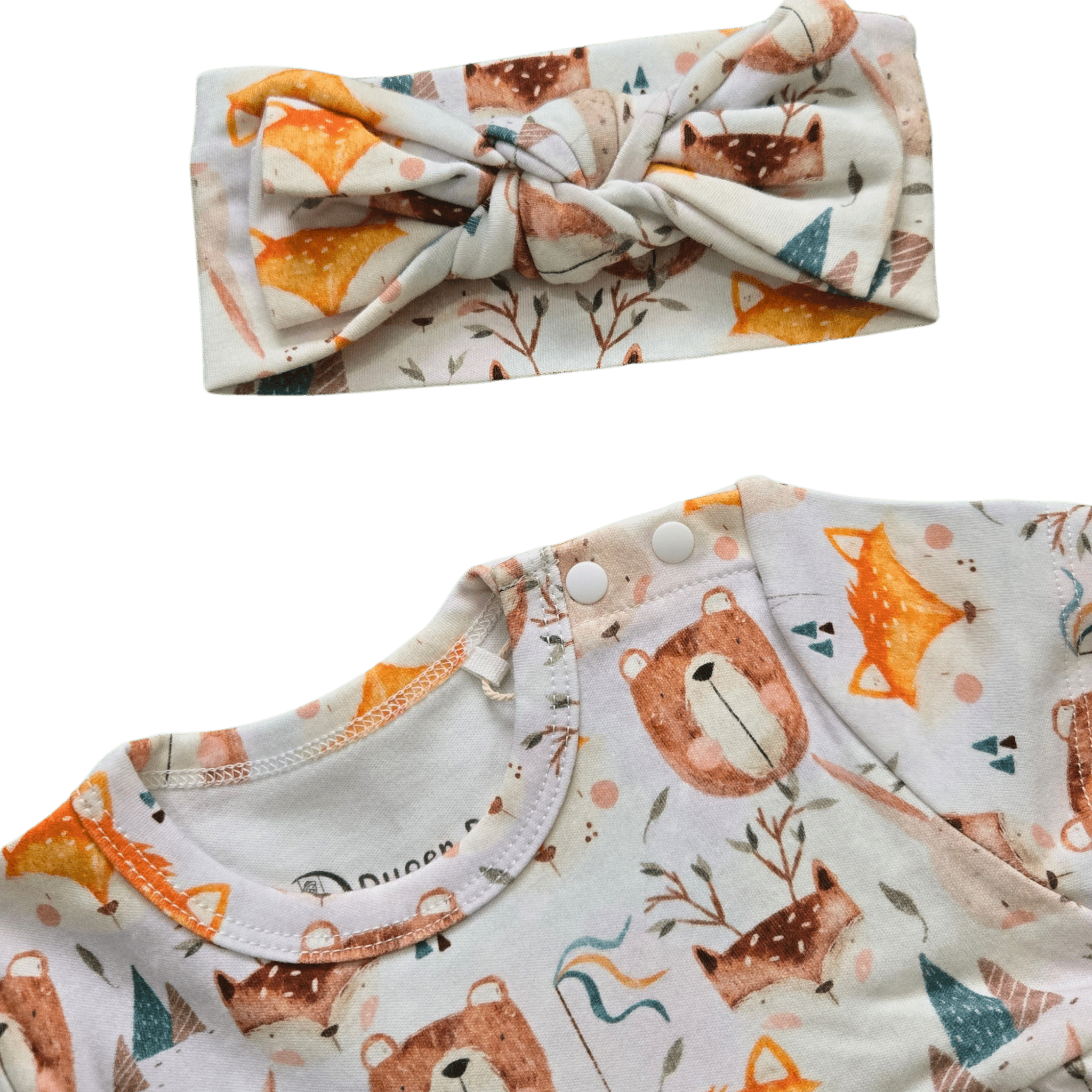 Organic cotton baby headband with safari animal print featuring bears and foxes