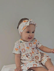 Baby girl wearing Wild Team organic safari dress onesie brand Duper DuDu design by a NICU nurse